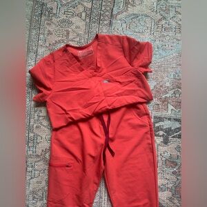 Figs red caterina scrub top and Zamora high waisted jogger pants